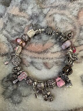 Pandora fireworks clasp bracelet with Pandora and Linx charms